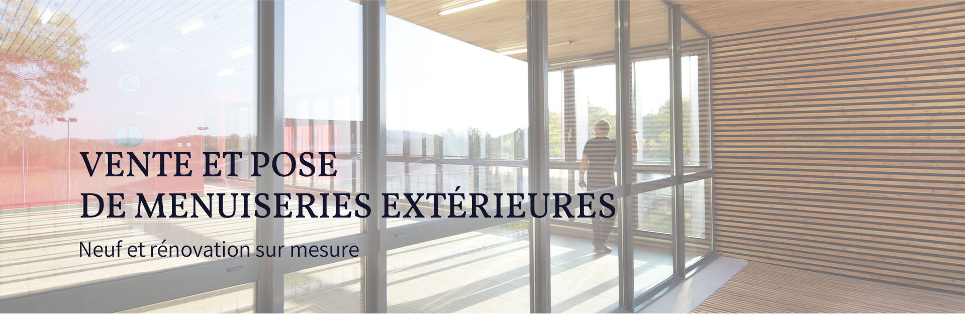 Pose de baies vitrées sur un bâtiment neuf